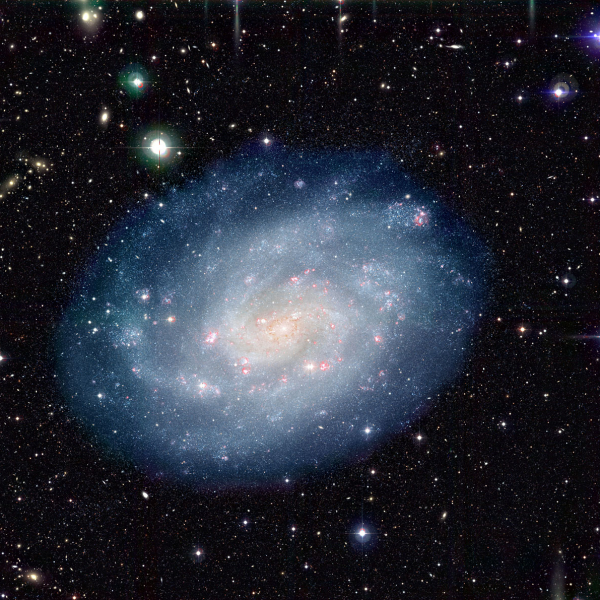 Colour-composite image of the nearby spiral galaxy NGC 300 and the surrounding sky field, obtained in 1999 and 2000 with the Wide-Field Imager (WFI) on the MPG/ESO 2.2-m telescope at the La Silla Observatory.