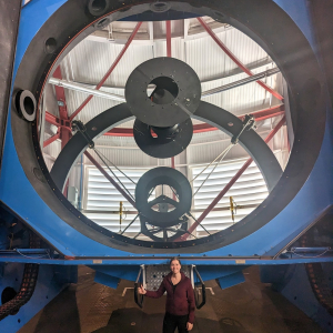 Paulina next o the Magellan Telescope, Clay, in the Las Campanas Observatory, May 2023